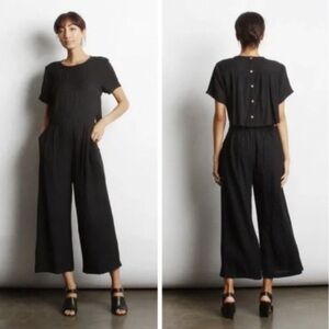 MOD REF BLACK OPEN BACK JUMPSUIT WITH POCKETS. SIZE S
